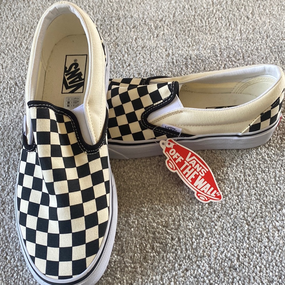 New in box.. a pair of Vans slip ons.. men’s size 9 or women’s size 10.5
